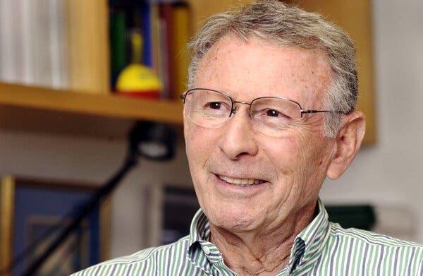 A person wearing glasses and smiling

AI-generated content may be incorrect.